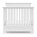 Petal Convertible Mini Crib with Mattress - White