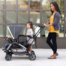 Sit N' Stand Multi-Use Easy Fold Travel Toddler and Baby Double Stroller with Safety Harness and Storage Basket - gray magnolia