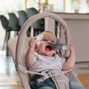 Bouncer with Toy Bar, Vibrates and Plays Music - Beige