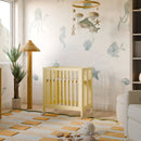 Rolli 9-in-1 Convertible All-Stages Crib with Bassinet & Toddler Bed Kits - Pale Yellow
